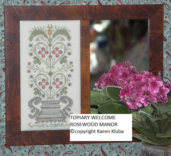 Topiary Welcome by Rosewood Manor
