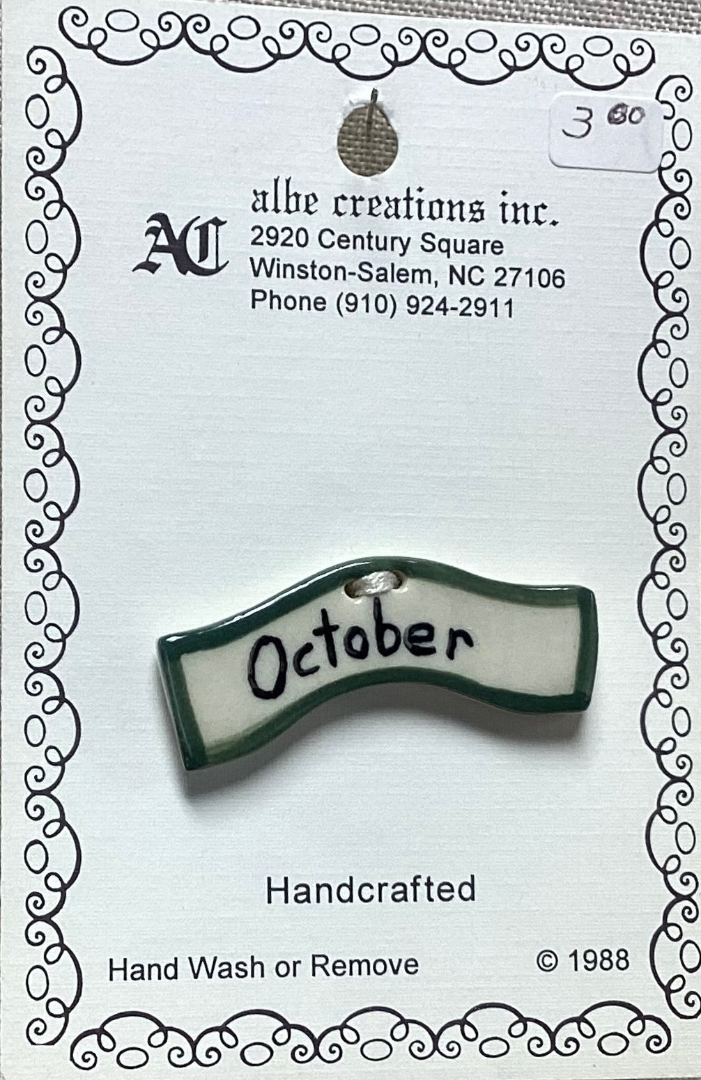 October Button by Albe Creations Inc.