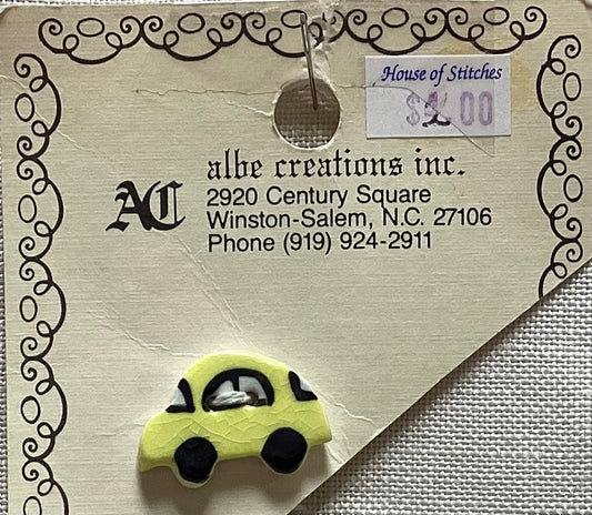 Yellow Car Button by Albe Creations Inc.