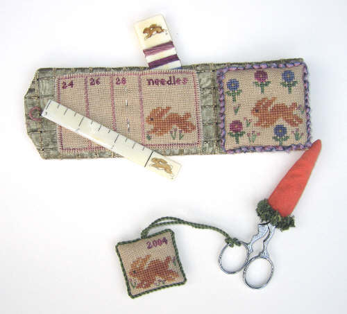 Bunnies in the Garden by With My Needle