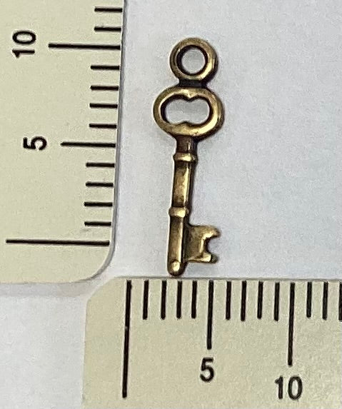 Antique Gold Skeleton Key Charm by By Jupiter
