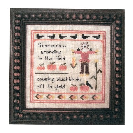 Scarecrow in the Field by Prairie Grove Peddler